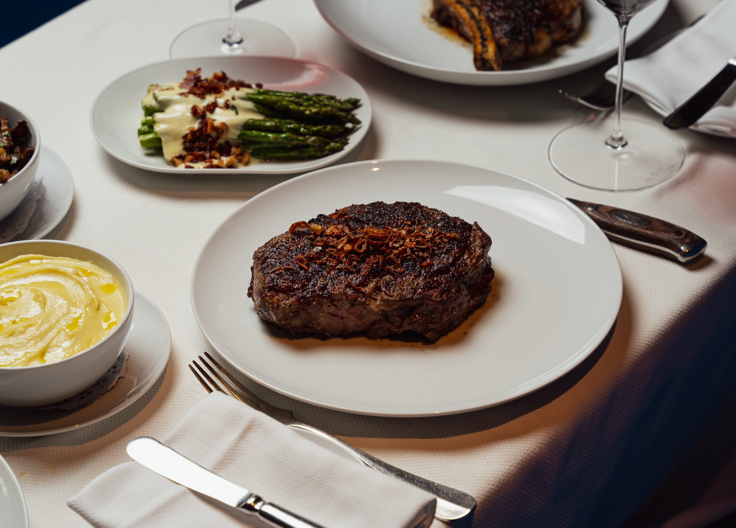 Close up of food on dining table in Delmonico's